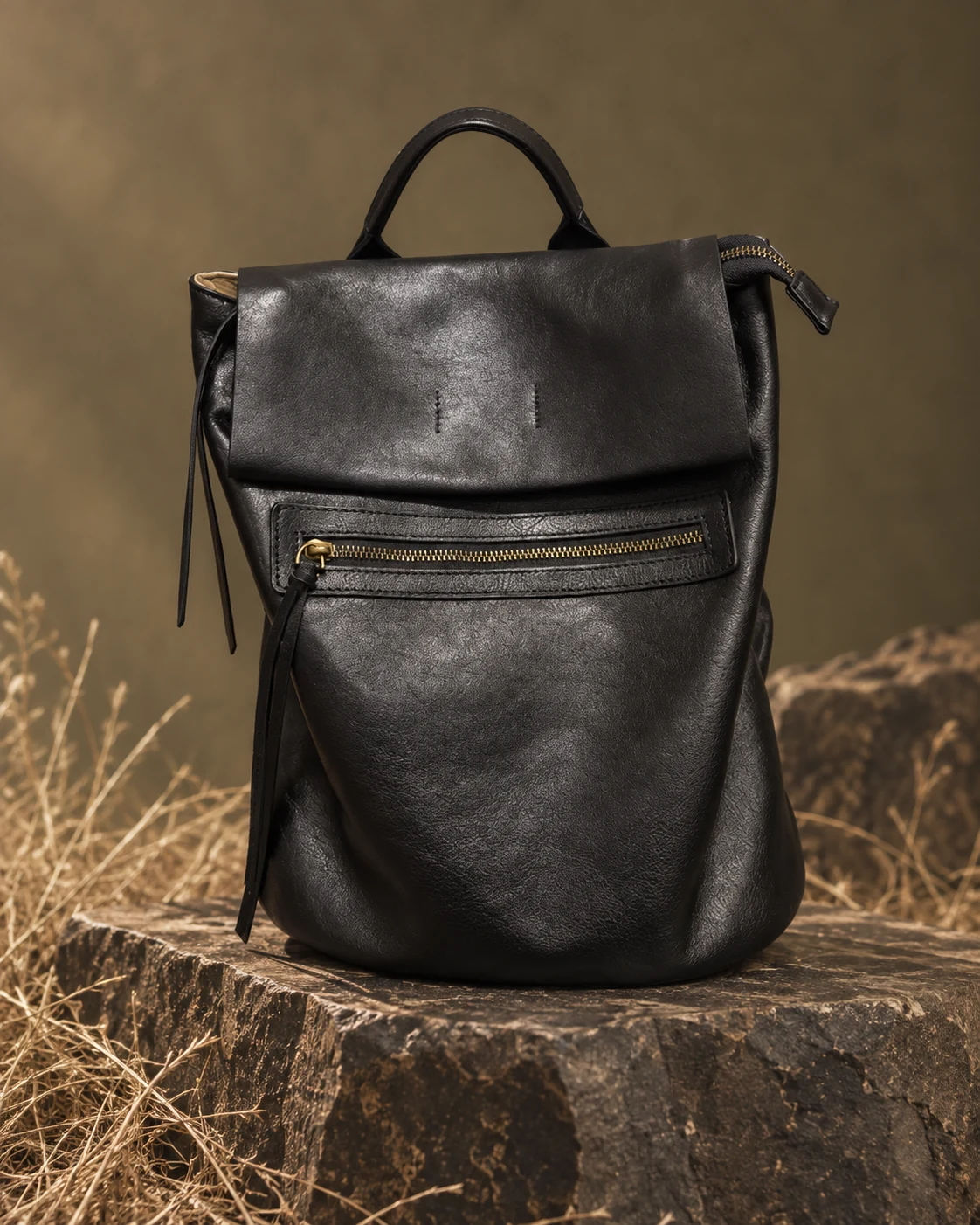 Top-grain cowhide backpack showing the leather surface